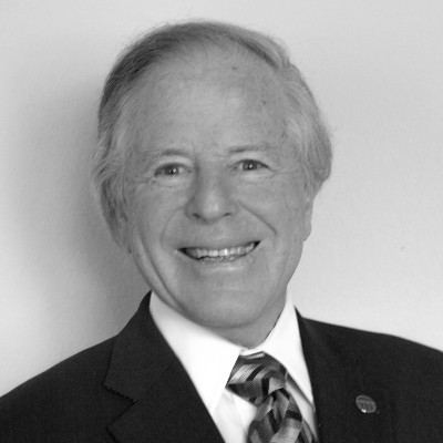 Charles R. Trimble, Chairman of the Board